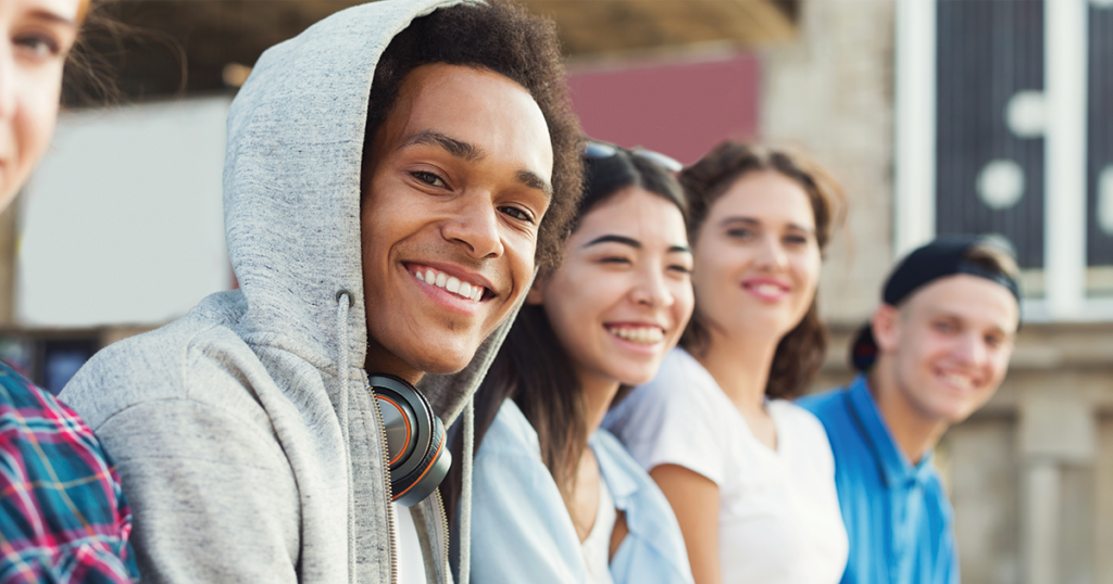 The effects of marijuana on teenage brains. Teens smiling.