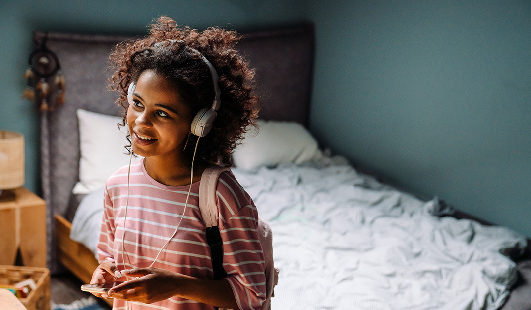 Girl with headphones. Is my teenager using?